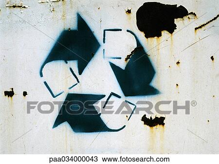 Drawing - Recycling symbol on rusty surface, close-up. Fotosearch