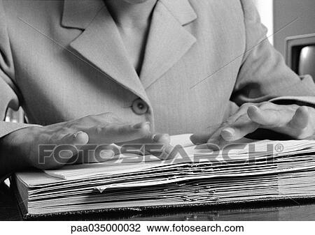 Hands on book, close-up, b&w View Large Photo Image Stock Image - Hands on book, close-up, b&w. Fotosearch
