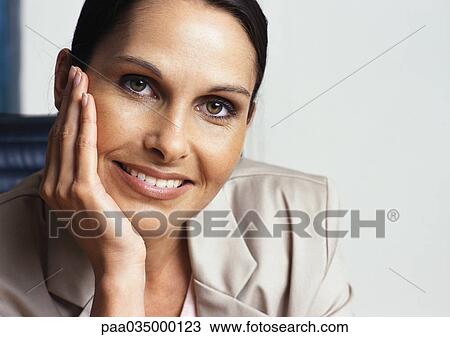 Stock Image - Woman smiling, close-up. Fotosearch