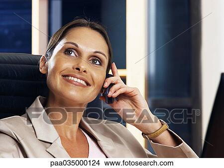 Woman telephoning, portrait View Large Photo Image Picture - Woman telephoning, portrait. Fotosearch