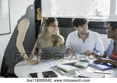 Business people working in office View Large Photo Image Stock Image - Business people working in office. Fotosearch