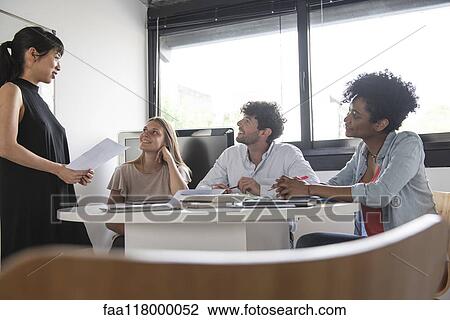 Business people working in office View Large Photo Image Stock Image - Business people working in office. Fotosearch