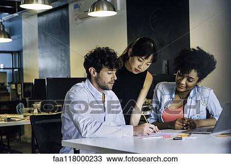 Business people working in office View Large Photo Image Stock Image - Business people working in office. Fotosearch