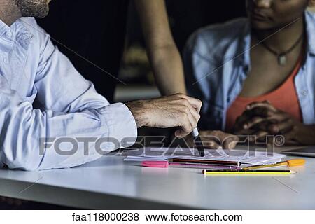 Business people working in office View Large Photo Image Stock Photo - Business people working in office. Fotosearch