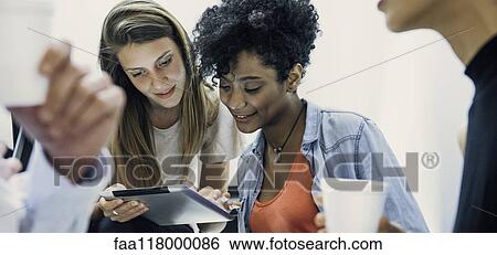 Business people working in office View Large Photo Image Stock Photograph - Business people working in office. Fotosearch