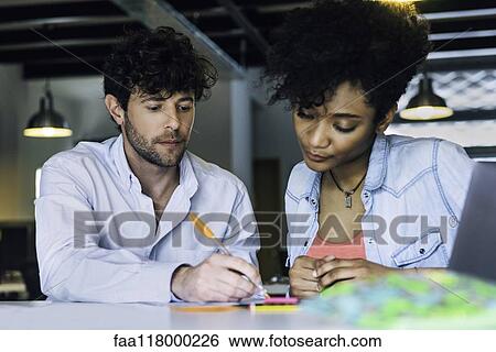 Business people working in office View Large Photo Image Stock Photograph - Business people working in office. Fotosearch