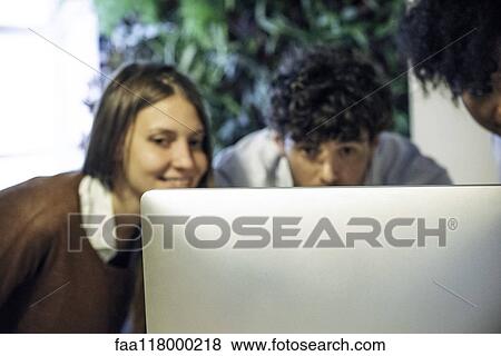 Business people working on computer in office View Large Photo Image Stock Photo - Business people working on computer in office. Fotosearch
