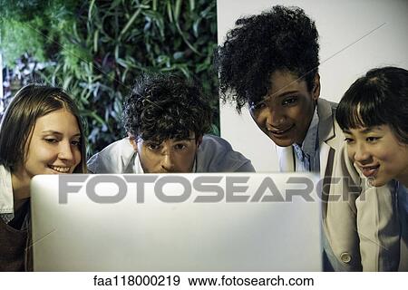 Business people working on computer in office View Large Photo Image Stock Photo - Business people working on computer in office. Fotosearch