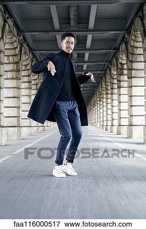 Businessman dancing outdoors View Large Photo Image Stock Photo - Businessman dancing outdoors. Fotosearch