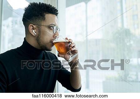 Businessman drinking wine View Large Photo Image Stock Photo - Businessman drinking wine. Fotosearch
