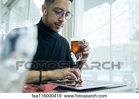 Businessman holding w View Large Photo Image Stock Photo - Businessman holding w. Fotosearch