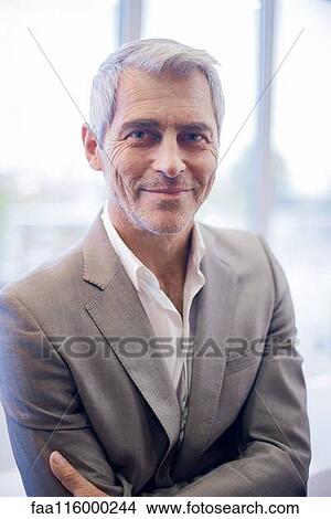 Businessman in office View Large Photo Image Picture - Businessman in office. Fotosearch