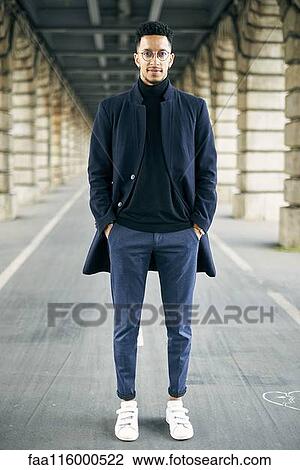 Businessman standing outdoors View Large Photo Image Stock Image - Businessman standing outdoors. Fotosearch