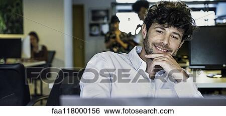 Stock Photograph - Businessman using laptop. Fotosearch