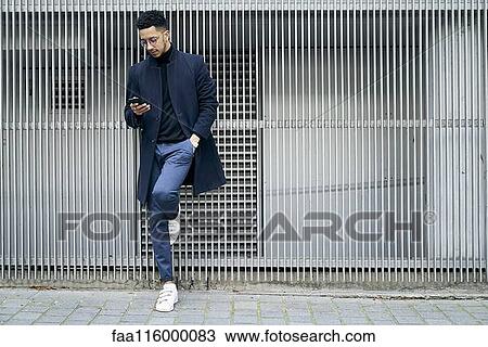 Businessman using smartphone View Large Photo Image Stock Image - Businessman using smartphone. Fotosearch