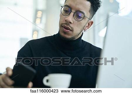 Businessman using smartphone View Large Photo Image Stock Image - Businessman using smartphone. Fotosearch
