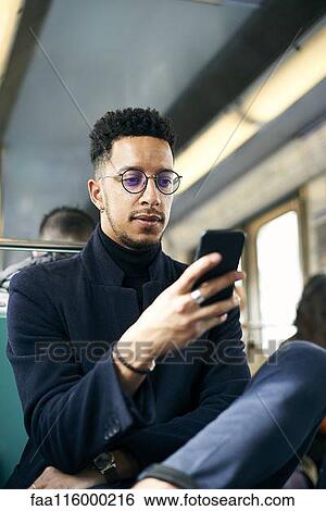 Businessman using smartphone View Large Photo Image Stock Photograph - Businessman using smartphone. Fotosearch