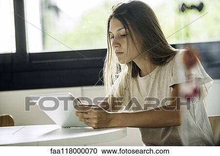 Businesswoman using digital tablet View Large Photo Image Stock Image - Businesswoman using digital tablet. Fotosearch