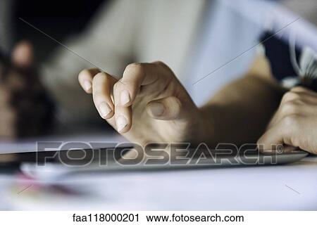 Businesswoman using digital tablet View Large Photo Image Stock Image - Businesswoman using digital tablet. Fotosearch