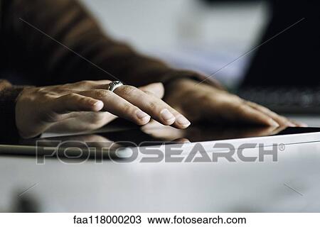 Businesswoman using digital tablet View Large Photo Image Stock Image - Businesswoman using digital tablet. Fotosearch