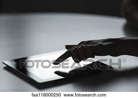 Businesswoman using digital tablet View Large Photo Image Stock Image - Businesswoman using digital tablet. Fotosearch