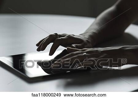 Businesswoman using digital tablet View Large Photo Image Stock Photo - Businesswoman using digital tablet. Fotosearch