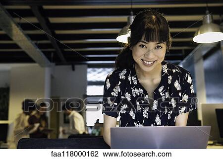 Businesswoman using laptop View Large Photo Image Stock Image - Businesswoman using laptop. Fotosearch
