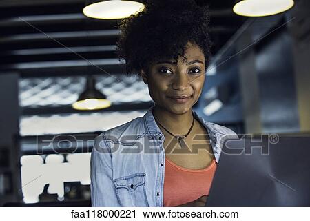 Businesswoman using laptop View Large Photo Image Stock Image - Businesswoman using laptop. Fotosearch