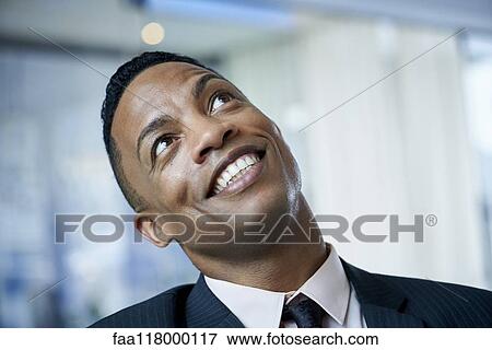 Stock Photo - Close-up of businessman in office. Fotosearch