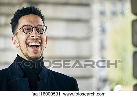 Close-up of businessman laughing View Large Photo Image Stock Image - Close-up of businessman laughing. Fotosearch