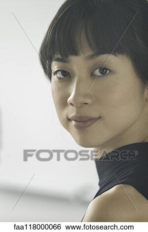 Close-up of businesswoman View Large Photo Image Stock Photograph - Close-up of businesswoman. Fotosearch
