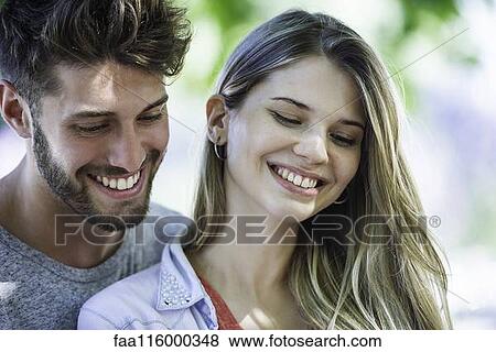 Stock Photo - Close-up of couple taking selfie. Fotosearch