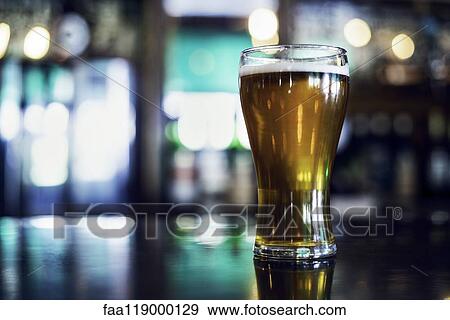 Close-up of drink served on table View Large Photo Image Stock Photo - Close-up of drink served on table. Fotosearch