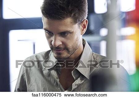 Close-up of engineer in office View Large Photo Image Stock Photography - Close-up of engineer in office. Fotosearch