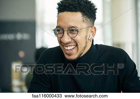 Stock Image - Close-up of smiling businessman. Fotosearch