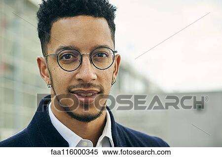 Stock Photography - Close-up of smiling businessman. Fotosearch