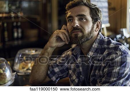 Close-up of thoughtful man View Large Photo Image Stock Image - Close-up of thoughtful man. Fotosearch