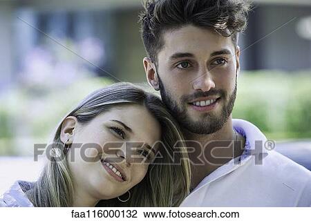 Stock Image - Close-up of young couple. Fotosearch