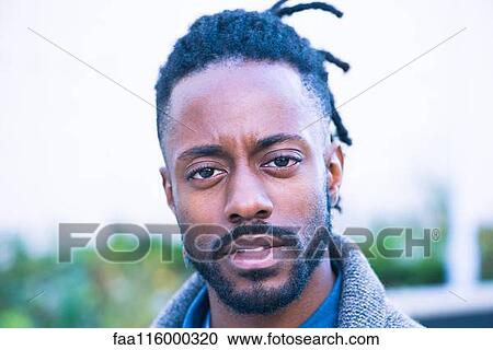 Close-up of young man View Large Photo Image Stock Image - Close-up of young man. Fotosearch