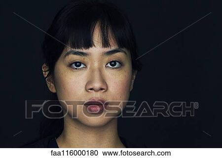 Stock Image - Close-up of young woman. Fotosearch