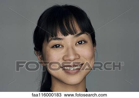 Stock Image - Close-up of young woman. Fotosearch