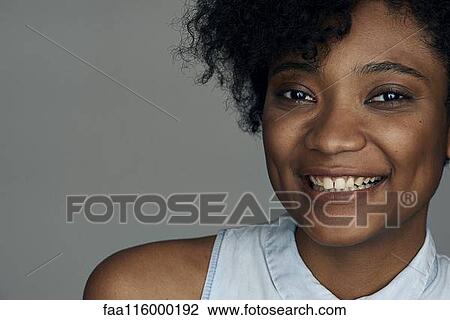 Stock Image - Close-up of young woman. Fotosearch