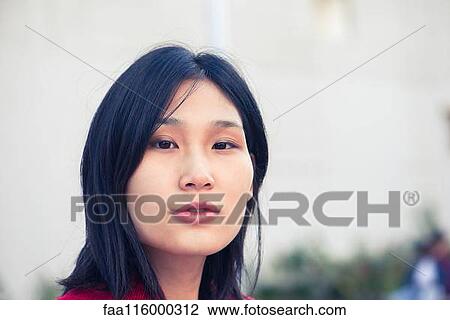 Close-up of young woman View Large Photo Image Stock Image - Close-up of young woman. Fotosearch