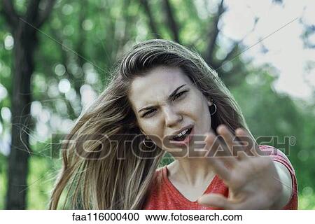 Close-up of young woman View Large Photo Image Stock Image - Close-up of young woman. Fotosearch