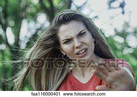 Close-up of young woman View Large Photo Image Stock Image - Close-up of young woman. Fotosearch