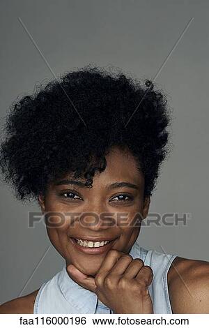 Stock Photograph - Close-up of young woman. Fotosearch
