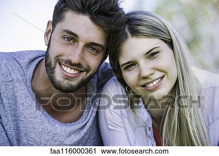 Close-up young couple in park View Large Photo Image Stock Image - Close-up young couple in park. Fotosearch