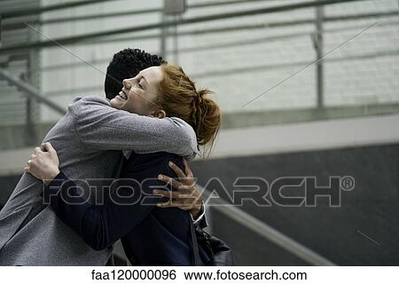 Couple embracing each other View Large Photo Image Stock Photograph - Couple embracing each other. Fotosearch