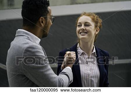 couple holding hands outdoors View Large Photo Image Stock Photography - couple holding hands outdoors. Fotosearch