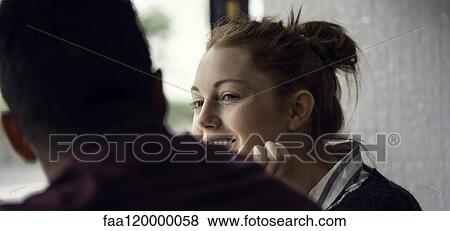 Couple sitting in restaurant View Large Photo Image Stock Photo - Couple sitting in restaurant. Fotosearch